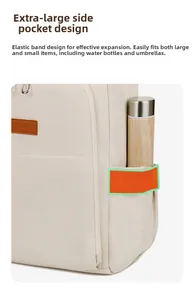 Detail view of the large elastic side pocket holding a bottle on this stylish backpack