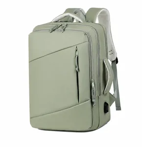 Detail view of water-resistant sage green travel backpack with external USB charging port