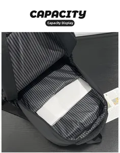 Detail view of large capacity interior with striped lining and laptop compartment