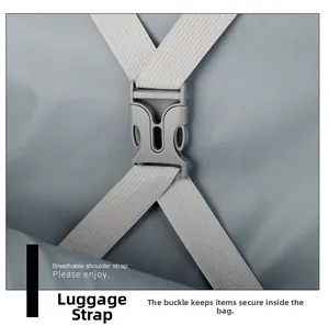 Detail of grey elastic luggage strap with plastic buckle for secure interior organization