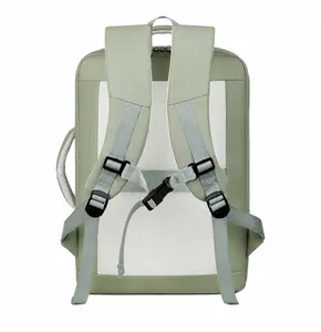 Detail view of breathable honeycomb mesh back and padded straps on light green backpack