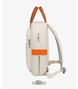 Side view of beige laptop backpack with brown handle and orange side strap details