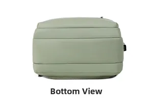 Detailed bottom view of light green travel backpack featuring external USB charging port