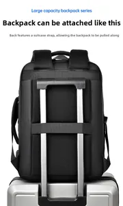 Business backpack featuring a rear luggage strap for secure trolley case attachment