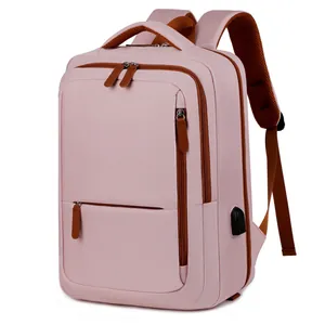 Pink waterproof travel backpack with USB charging port and ergonomic back padding