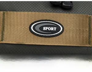 Detailed close-up of water-resistant oxford fabric and the SPORT rubber logo on the bag