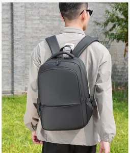 Rear view of a black water-resistant business backpack with ergonomic padded straps
