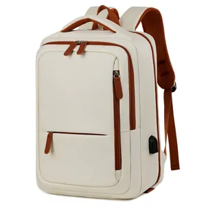 Large beige travel backpack with USB port and multiple pockets for business or short trips