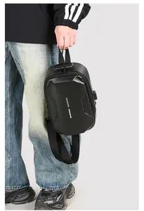 Detail of waterproof carbon fiber chest bag featuring USB port and security combination lock