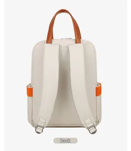 Detailed back view of a beige laptop backpack with orange straps and brown leather handle
