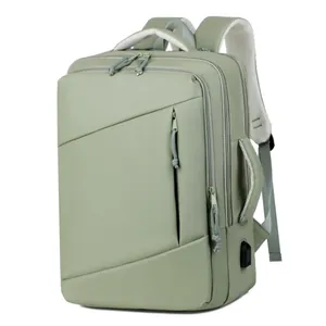 Expandable mint green travel backpack with USB charging port and waterproof laptop compartment