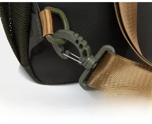 Macro detail of high-density strap with rotatable green tactical swivel hook