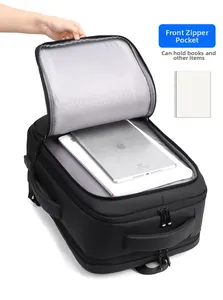Front zipper pocket of black business backpack showing grey honeycomb lining and storage