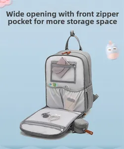 Detailed view of the large opening gray diaper bag with multiple storage compartments