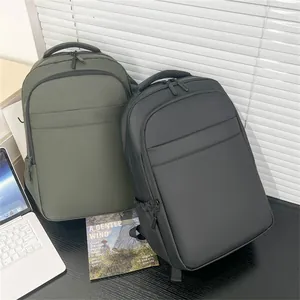 Macro shot of waterproof nylon business backpack in dark green and black matte finish