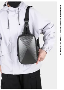 Detail view of carbon fiber texture hard shell chest bag with USB charging port