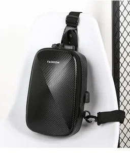 Detail of hard shell chest bag featuring carbon fiber texture and anti-theft combination lock