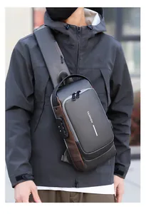 Detail of multi-functional chest bag showing the anti-theft code lock and USB charging port