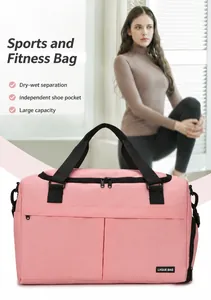 Pink sports bag detail showing the separate shoe compartment and wet/dry storage pockets