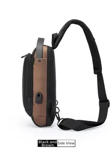 Detail view of men's sling bag in black and brown featuring external USB charging port