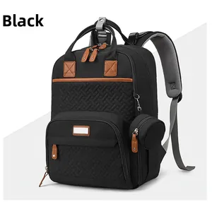 Macro view of black multifunctional diaper backpack with quilted texture and side pouch