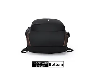 Bottom view of black and brown motorcycle chest bag showing USB port and security lock