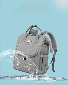 Waterproof grey diaper backpack with high-density fabric and large front pocket