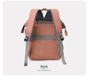 Detail view of the backpack back with padded mesh straps and a luggage strap