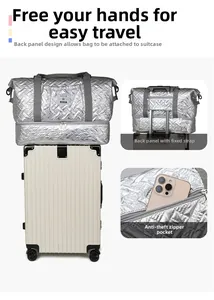 Detail of silver quilted travel bag with trolley sleeve and anti-theft zipper pocket