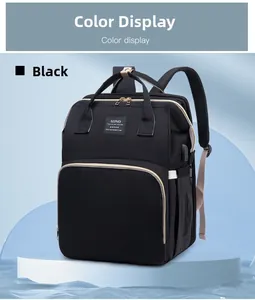 Detail of black maternity backpack with external USB charging port and durable fabric
