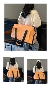 Vue latérale d'un grand sac de fitness avec compartiment à chaussures et bandoulière