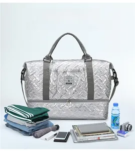 Silver quilted travel bag showing dry wet separation compartment and shoe storage space