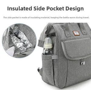 Detail of insulated side pocket with aluminum foil lining for baby bottle temperature