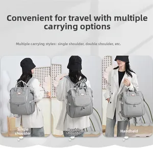 Three-way carry modes: light grey diaper backpack shown as handbag, shoulder and tote bag