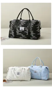 Close-up of wave embroidery and Fashion Travel label on high-capacity sports bags