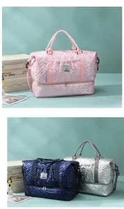 Detail of travel bag showing waterproof glossy texture and bottom shoe compartment