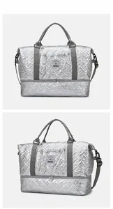 Silver quilted travel bag featuring independent shoe compartment and metallic finish