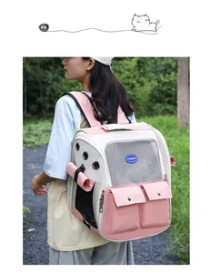Detail view of pink and white pet backpack with mesh windows and storage pockets