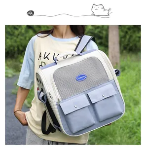 Detail of breathable mesh and front pockets on light blue pet carrier backpack