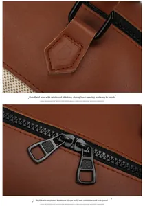 Detail of durable dual zippers and reinforced stitching on large canvas travel bag