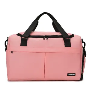 Borsa da viaggio rosa impermeabile con scomparto umido-secco e fascia trolley