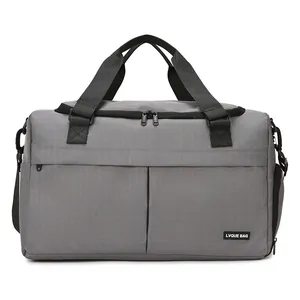 Borsa da viaggio grigia impermeabile con fascia trolley e separazione bagnato