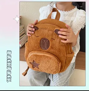Close-up of plush Capybara backpack featuring soft brown fur and star embroidery details