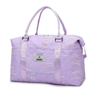 Lavender quilted travel duffel bag with colorful wave embroidery and large capacity