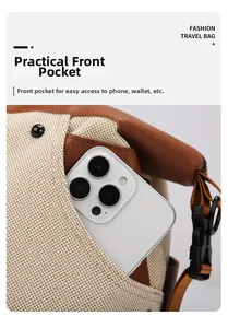 Detail of the practical front pocket on the canvas duffel bag for small items