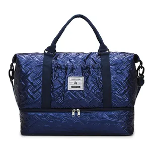 Navy quilted duffle bag with a separate shoe compartment for fitness travel and sports