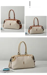 Close-up of canvas travel bag featuring premium leather handles and metal hardware