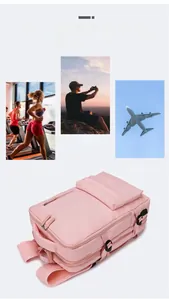 Detail view of pink waterproof travel backpack with multiple zip pockets and handles