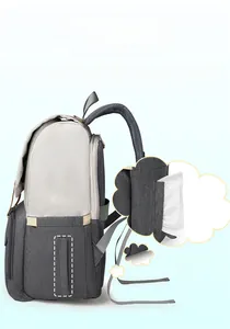 Detail of the side tissue pocket with zipper on a grey multifunctional diaper backpack
