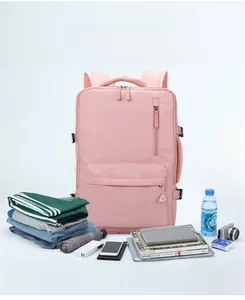 Pink travel backpack showing high capacity with clothes, gadgets and daily essentials